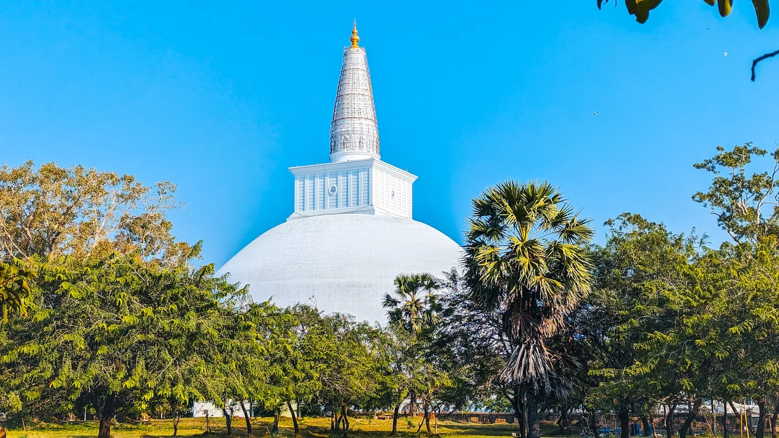 Ruwanwelisaya white stupa above gardens in Anuradhapura