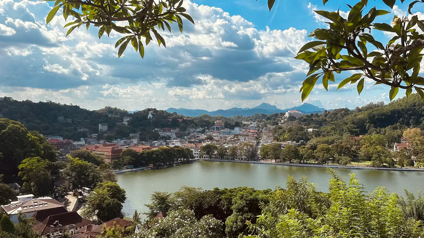 Panoramic view across Kandy Lake and the city hills in Sri Lanka