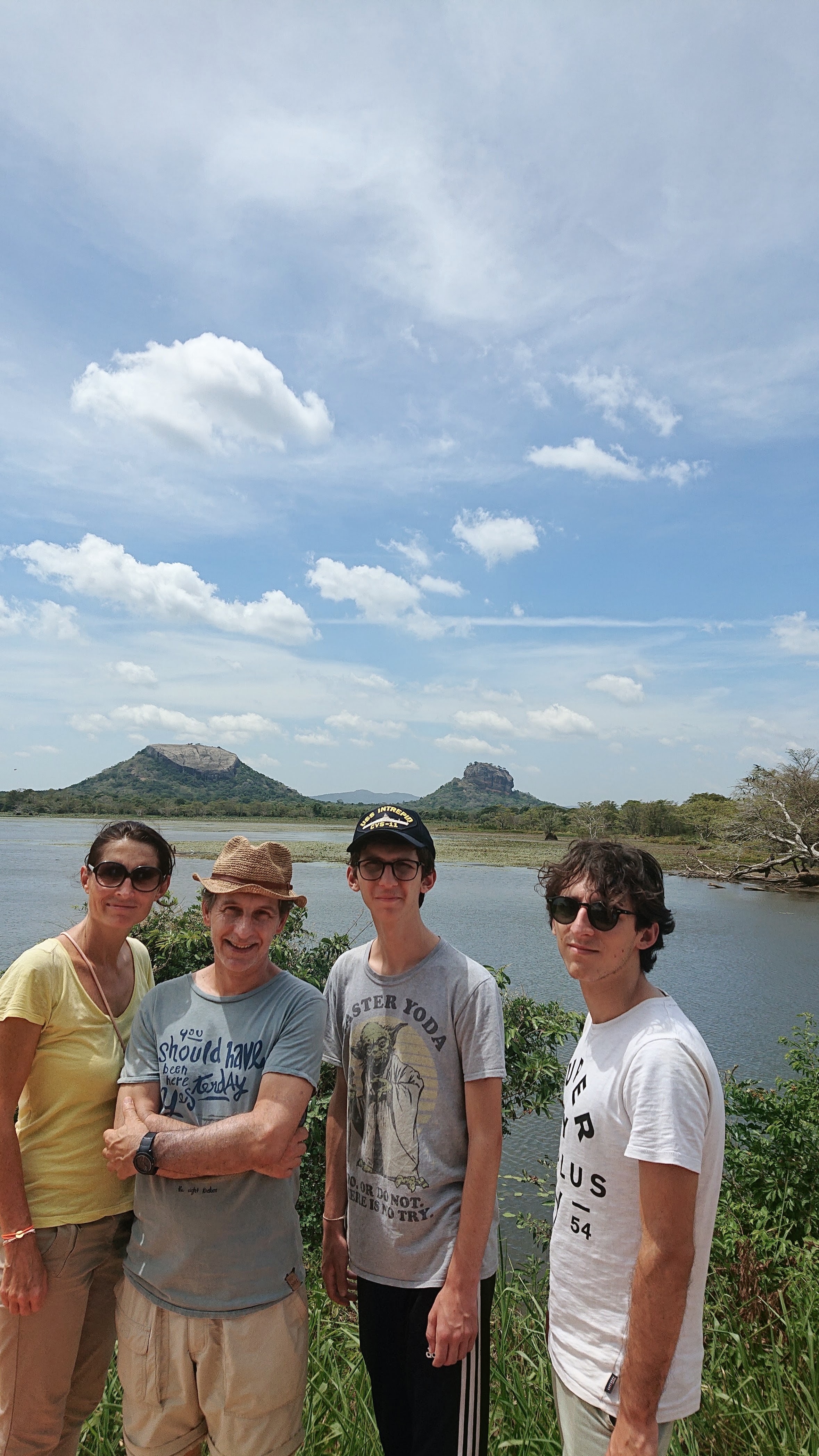 Family near the Pidurangala landscape and lake