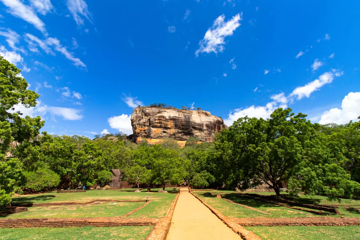 Sigiriya Rock Fortress rising above the royal water gardens