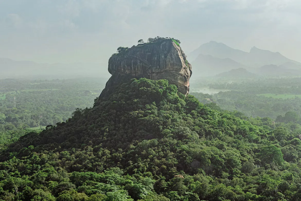 Misty morning view of Sigiriya Rock above Sri Lanka's Cultural Triangle