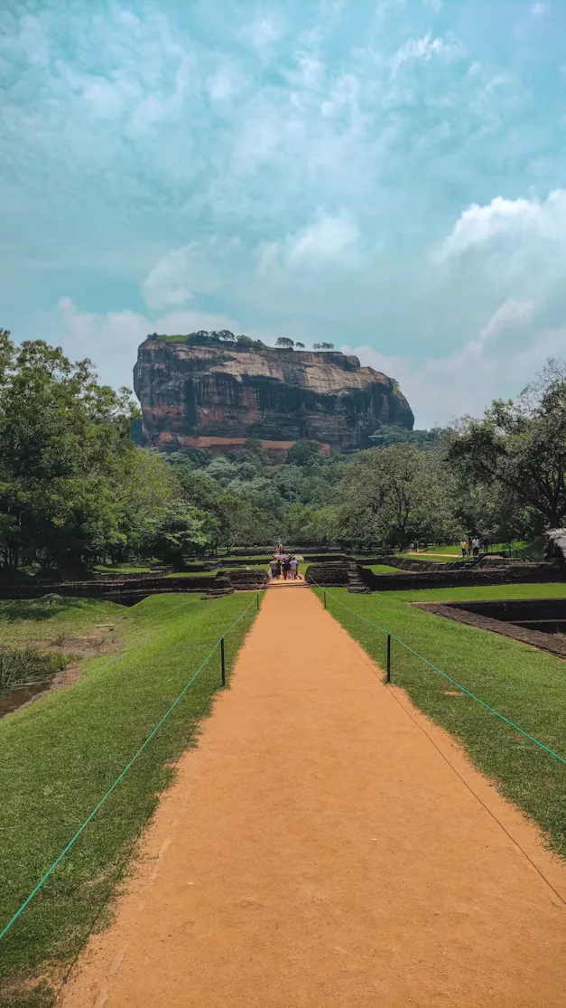 Path through the royal water gardens towards Sigiriya Rock Fortress
